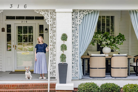 Melissa on the front porch at New South Home's design studio in Matthews, North Carolina.